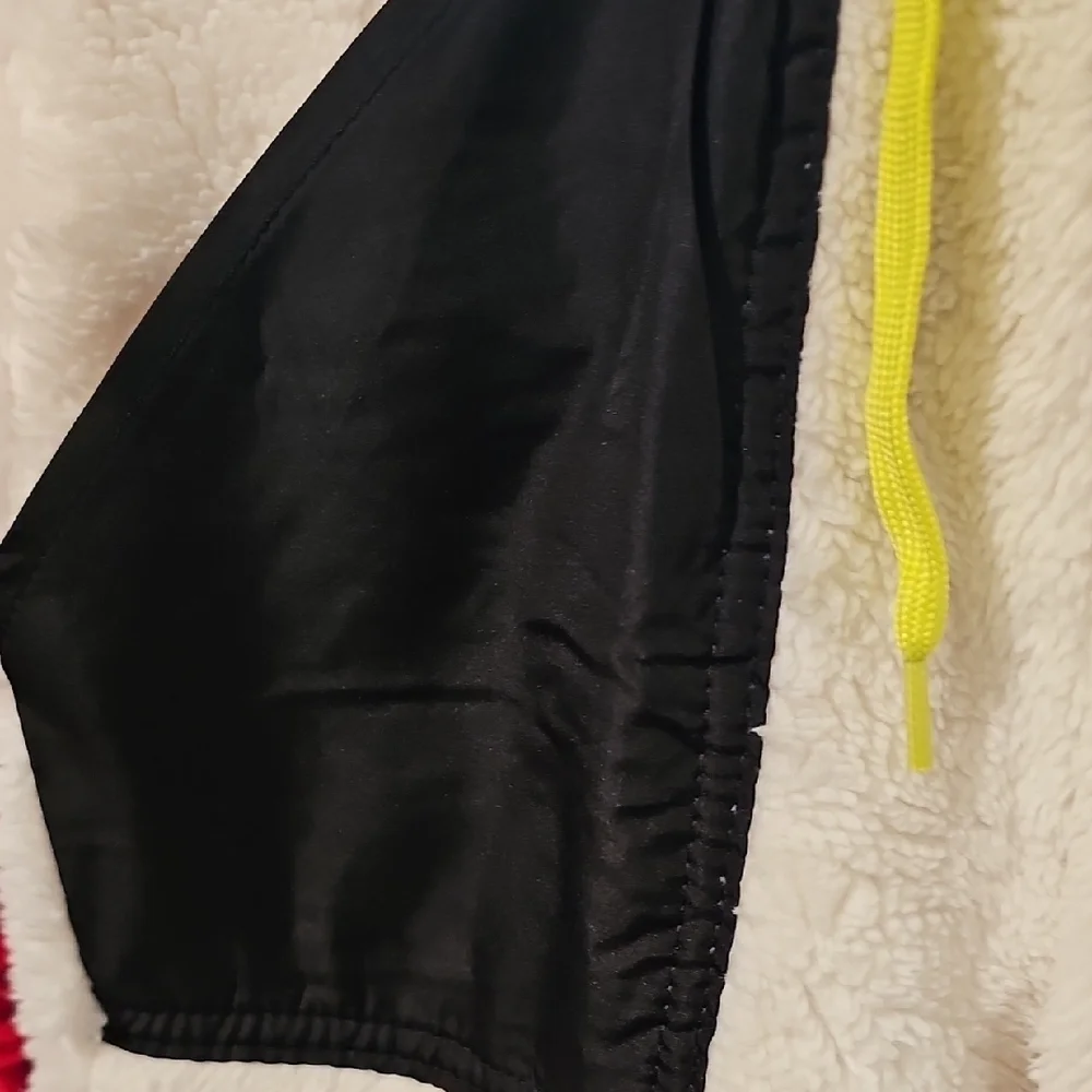 Justice NWT Girls Cream and Black Fleece  Bottoms With Grinch Detail